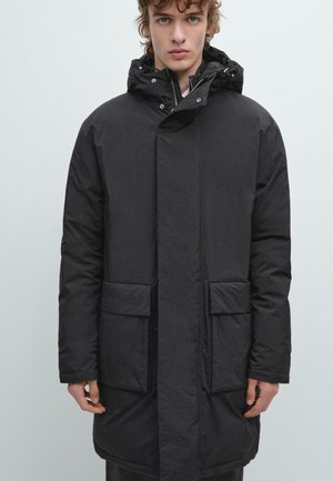 WATER-REPELLENT WITH HOOD  - Parka - black