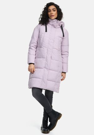 Lilac puffer coat with a high collar, black drawstrings, and quilted design. Paired with dark gray jeans and black lace-up boots.