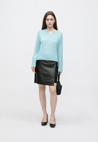 Bruuns Bazaar VEGANI VISTINA SKIRT - Saia envelope - black