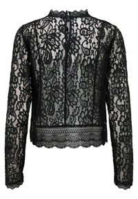 Blouse noire en dentelle transparente à manches longues, motifs floraux, ourlet festonné, col haut et fermeture au dos avec bouton et ouverture en forme de trou de serrure.