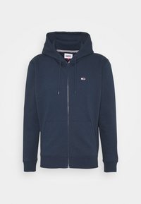 Felpa con zip colore navy realizzata in morbido cotone misto, dotata di una grande tasca frontale, cappuccio regolabile con coulisse e piccolo logo sul petto.