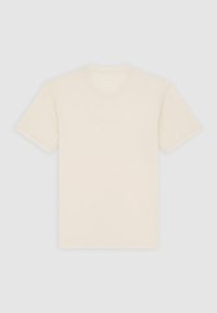 Krémové tričko s krátkým rukávem, kulatým výstřihem a hladkým povrchem, pohled zezadu, ukazující minimalistický design.