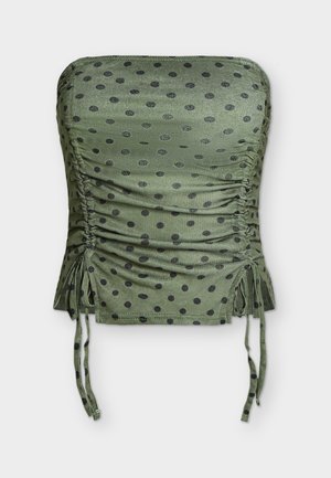 Crop top λαδί χωρίς τιράντες με μαύρες πουά, ραμμένες πλευρές και ρυθμιζόμενα κορδόνια στο κάτω μέρος.