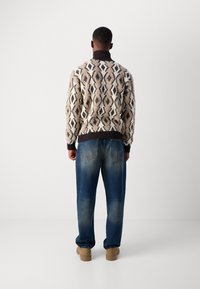 Scotch & Soda ARGYLES DROPPED SHOULDER PULLOVER - Strickpullover - eggnog