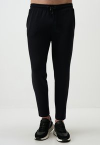 SLIM FIT - Spodnie treningowe