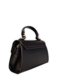 Sac à main en cuir noir avec poignée supérieure, ferrures dorées et détail zippé, présenté en angle latéral sur fond blanc.