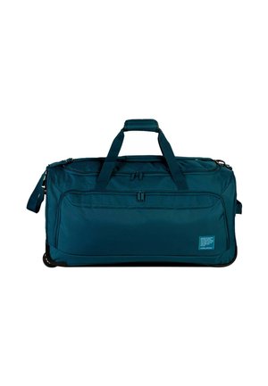 Grand sac de voyage à roulettes bleu sarcelle foncé avec doubles poignées, poche zippée à l'avant et bandoulière réglable sur fond blanc.