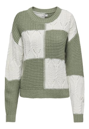 Kootud pullover-sviiter oliivrohelises ja valges, millel on kirjud mustrid tekstuursete ketramise mustrite ja soonikute otstes.