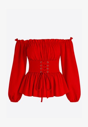 Top rojo con hombros descubiertos, mangas abullonadas, cintura ajustada, detalle de cordones y bajo de peplum acampanado. Tela suave con un color intenso.