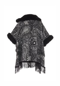 Poncho a righe in bianco e nero con bordo in pelliccia sintetica, orlo con frange, design ampio e fantasia paisley su tutto il capo.