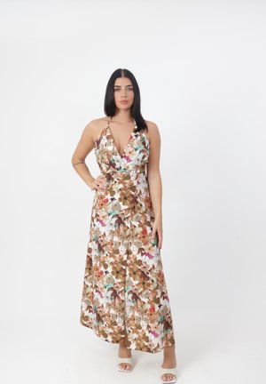Robe maxi avec un col halter dans un motif floral présentant des teintes de rose, de turquoise et de brun. Fabriquée en tissu léger avec une silhouette fluide.