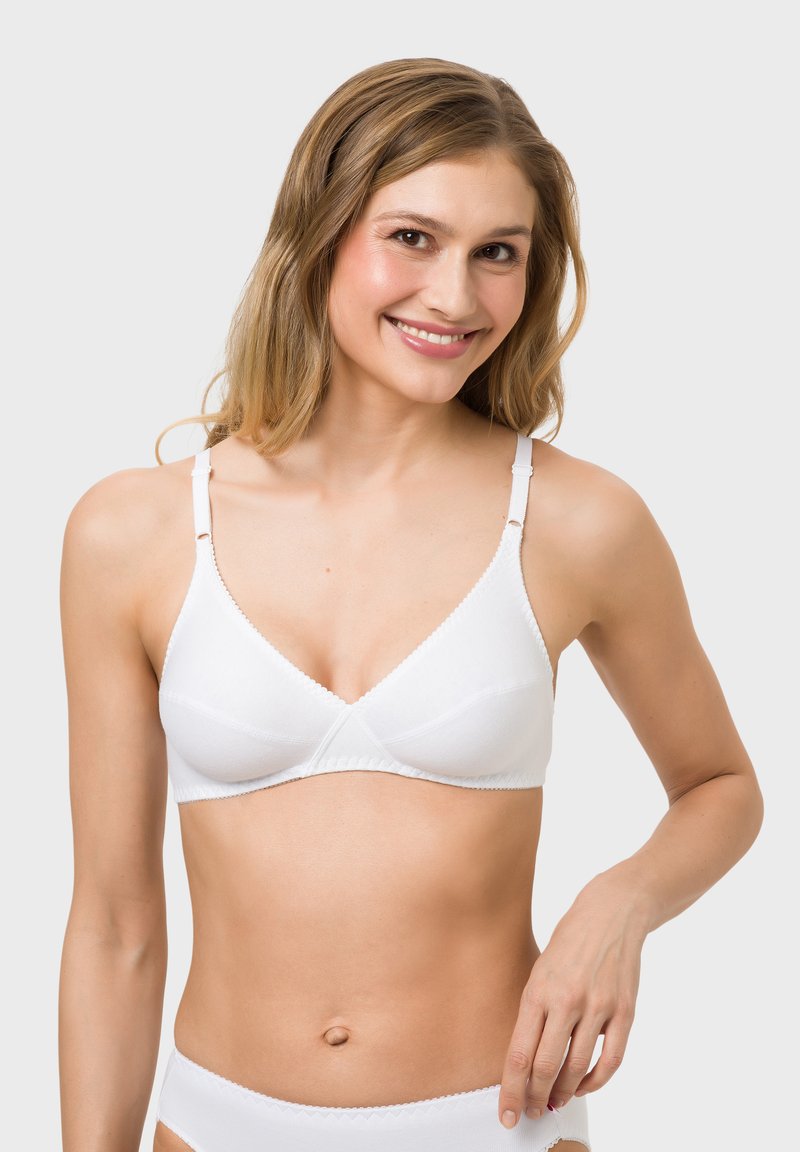 White triangle bra made of soft fabric, featuring adjustable straps, scalloped edges, and a seamless design, paired with a matching brief.