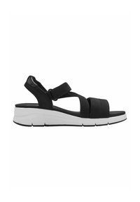 Sandalias negras con tiras cruzadas, correa en el tobillo ajustable y una suela plataforma blanca con detalles texturizados. Diseño ligero.