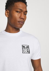 Obey Clothing EYES ICON - Potiskana majica - white