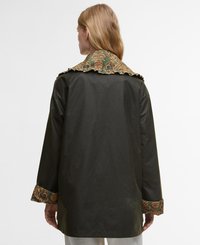 Dark green jacket with a patterned orange and green collar and cuffs. Features a loose fit and a plain back without additional details.