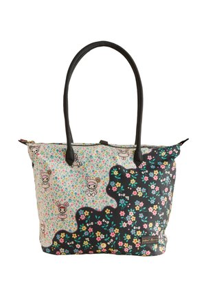 Torba s crnim ručkama, polovina prekrivena malim šarenim cvjetovima na crnoj pozadini, polovina s likovima crtane medvjediće na krem pozadini s cvjetnim uzorkom.