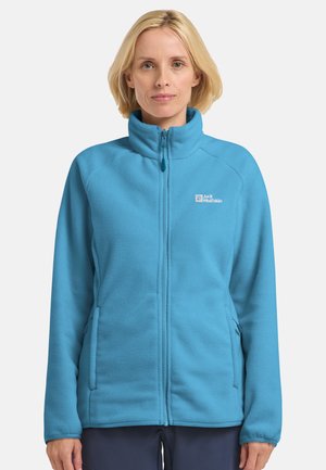 Lichtblauwe fleece jas met hoge kraag, frontale rits en zijzakken; voorzien van een klein logo op de linkerkant van de borst.