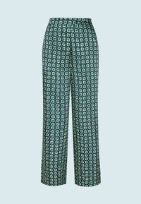Pantaloni a fiori in blu scuro con fiori verdi e bianchi, dotati di una vita elastica e di un design a gamba larga. Tessuto leggero.