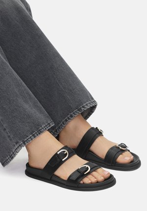 Jenny - Klapki płaskie