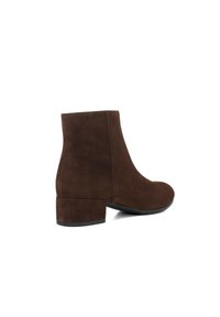 Brown suede ankle boots with a rounded toe and a low block heel, featuring smooth texture and sleek design.