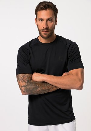 Zwarte sportieve t-shirt met een ronde halslijn en korte mouwen. Bevat een subtiel logo op de borst en een gladde, rekbare stofstructuur.