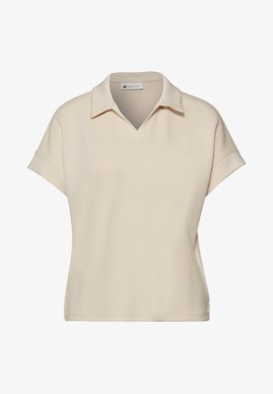Polo beige à manches courtes avec col en V ouvert et poignets repliés, réalisé en tissu lisse, col étiqueté "Street One".