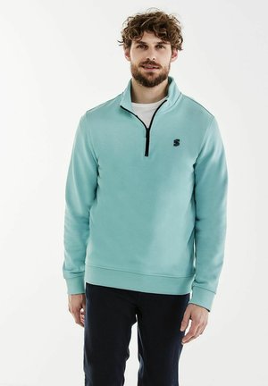 Lichtblauwe kwart-rits sweatshirt van zachte stof, met een zwarte rits en logo, met een relaxte pasvorm en ribbelcuff en -zoom.