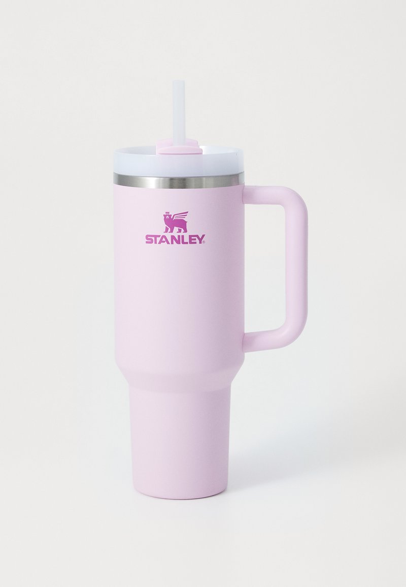 Pink stainless steel tumbler with a silver rim, handle, and a straw. Features a matte finish and a logo in purple on the body.