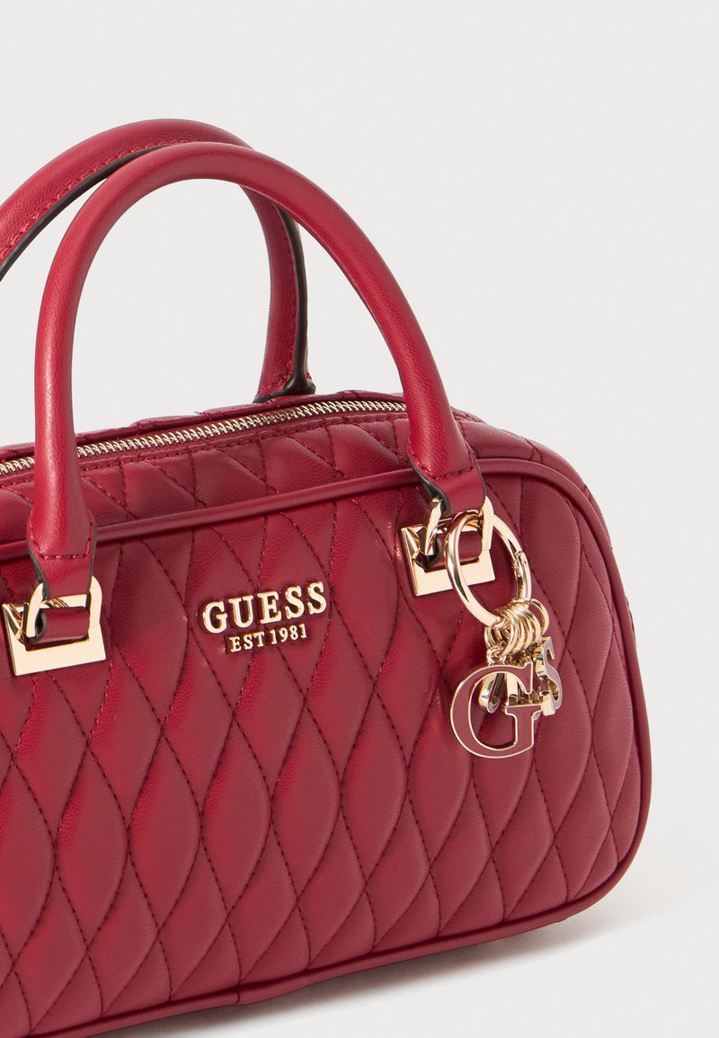 Sac Guess Tulip Status Satchel Rouge - Occasion - Photo Indicative