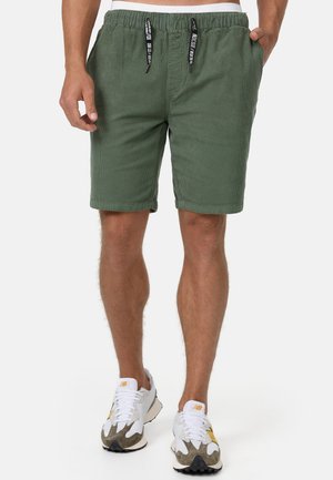 Groene katoenen shorts met een elastische tailleband en zwarte trekkoorden, gemaakt van een textuurstof en met een relaxed fit, eindigend net boven de knie.