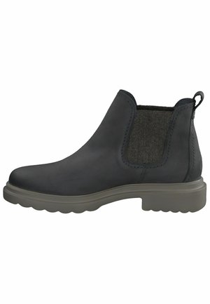 Black leather ankle boot with elastic side panels, textured grey fabric accents, and a chunky rubber sole featuring a wavy tread pattern.