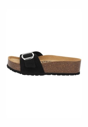 Sandalo scivolato in suede nero con un accentuato cinturino in argento, suola intermedia in sughero e suola esterna in gomma testurizzata, progettato per il comfort e l'uso quotidiano.