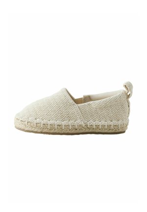 Beige slip-on espadrille with diamond-patterned fabric upper, woven jute sole, and pull tab at heel.