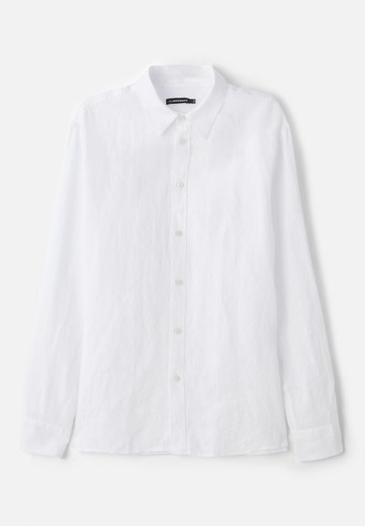 Witte langarm overhemd met knopen, gemaakt van een textuurstof. Heeft een klassieke kraag en een knoopsluiting aan de voorkant met kleine, ronde knopen.