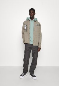 Carhartt WIP AVIATION PANT COLUMBIA - Calças cargo - blacksmith rinsed