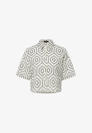 Kurzärmelige Bluse aus cremefarbenem Stoff mit einem schwarzen hexagonalen Muster, ausgestattet mit einem Kragen und Knopfverschluss. Das strukturierte Design verleiht der Bluse Tiefe.