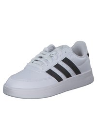 White athletic shoe with a smooth texture, featuring three black stripes on the side, and a cushioned sole for comfort.