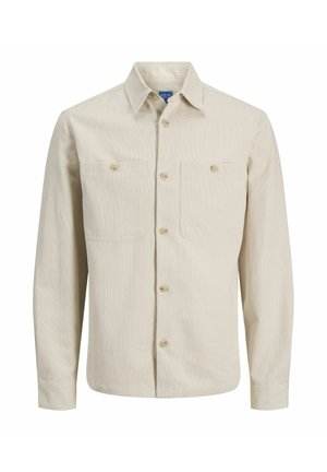Béžová košile na knoflíky s dlouhými rukávy, texturovaným materiálem, dvěma předními kapsami a jednoduchými světle hnědými knoflíky. Ležérní, univerzální design.