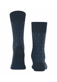 Navy blue socks featuring a geometric pattern. Made of soft material with ribbed cuffs and reinforced heel and toe sections.