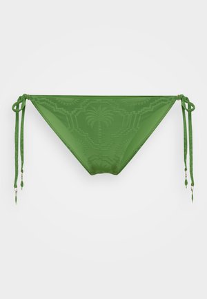 Zelena Bikini spodnjica z motivom palmovih dreves. Prilagodljive vrvice na straneh vsebujejo okrasne kroglice. Gladka tekstura in trikotna oblika.