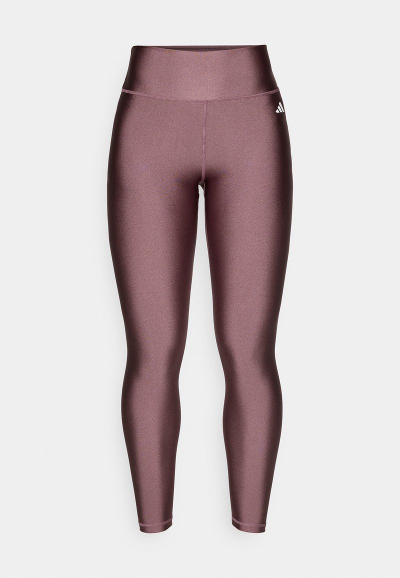Leggings mit einem hohen Taillenbund, hergestellt aus einem glatten, dehnbaren Material in metallic Mauve. Beinhaltet dezente Markierungen an der Seite.