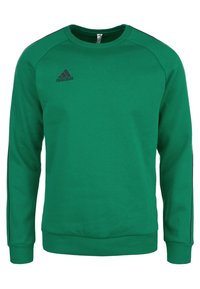 Sudadera verde de cuello redondo confeccionada en una suave mezcla de algodón. Presenta puños y dobladillo acanalados, además de acentos negros con tres rayas en los hombros. Logo de Adidas exhibido.