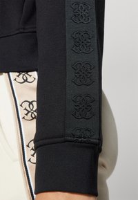 Guess STACIE FULL ZIP SWEATSHIRT - Zip-up sweatshirt - jet black