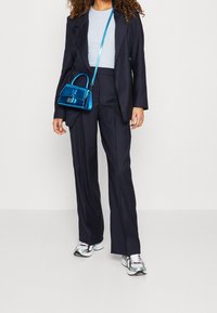 Vero Moda Kalhoty - dark blue