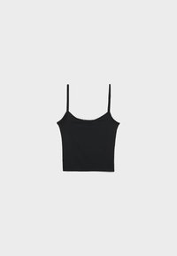 Haut camisole noir court avec fines bretelles spaghetti sur un fond gris clair uni.