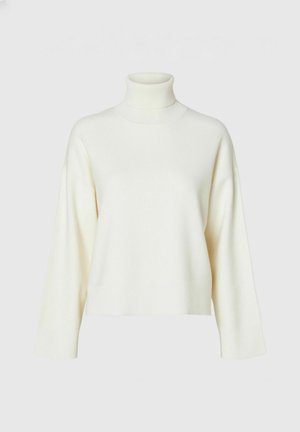 Hvit turtleneck genser, oversized passform, ribbestrikket krage og mansjetter, myk tekstur, lange ermer, og en croppet hem.