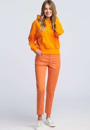 Jeansy Slim Fit - orange