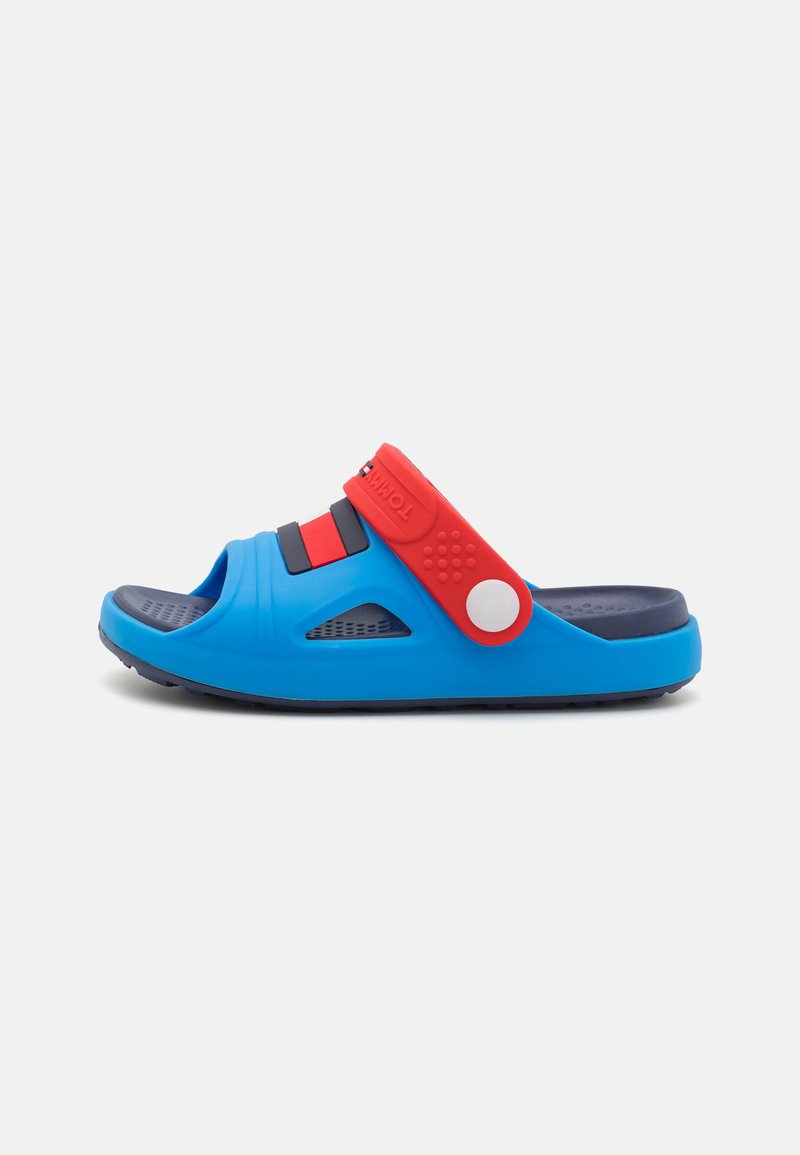 Blue rubber slide sandal featuring a wide red strap with black and blue accents, open toe design, and textured sole for grip.