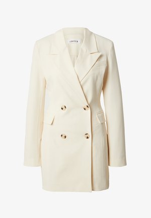 Doppelt geknöpfter Creme-Blazer mit Reverskragen, goldfarbenen Knöpfen und zwei Fronttaschen; strukturiertes Design mit leicht übergroßer Passform.