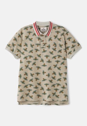 Beige polo-paita, jossa on punaraidallinen kaulus ja koko pinnan kattava kuvio värikkäistä avaruusaluksista ja kukista. Lyhyet hihat ja rento istuvuus.